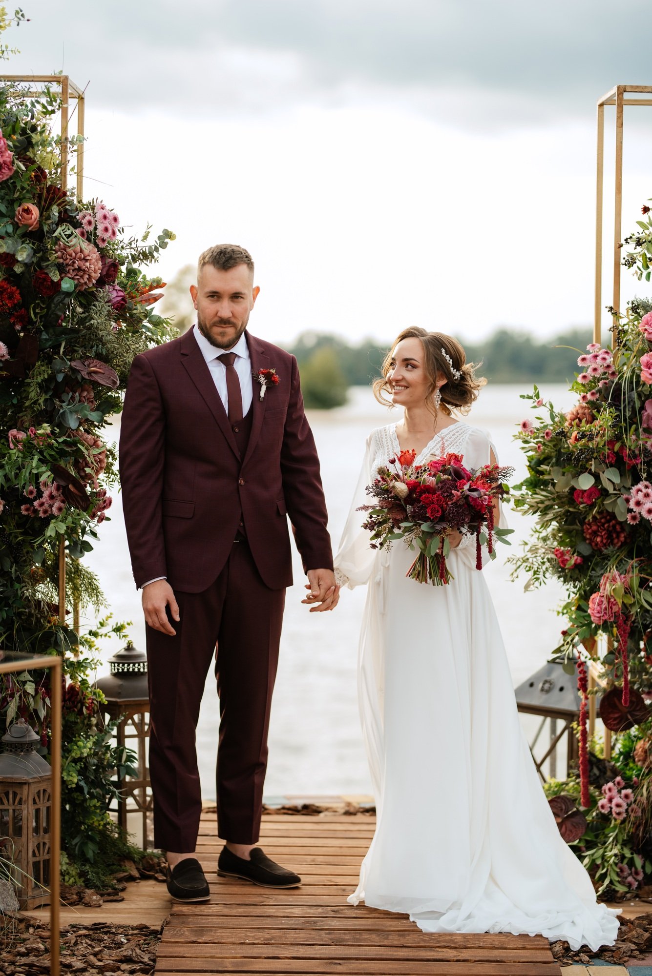 wedding ceremony of the newlyweds on the pier